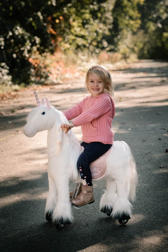 PONNIE Einhorn mit Rollen Unicorn S für Kinder 3–6 J (30 kg) – Ohne Batterie – Mitwachsend Dank höhenverstellbarer Steigbügel – Kämmbar, mit abnehmbarem Rosa Sattel – drinnen&draußen – 87 cm