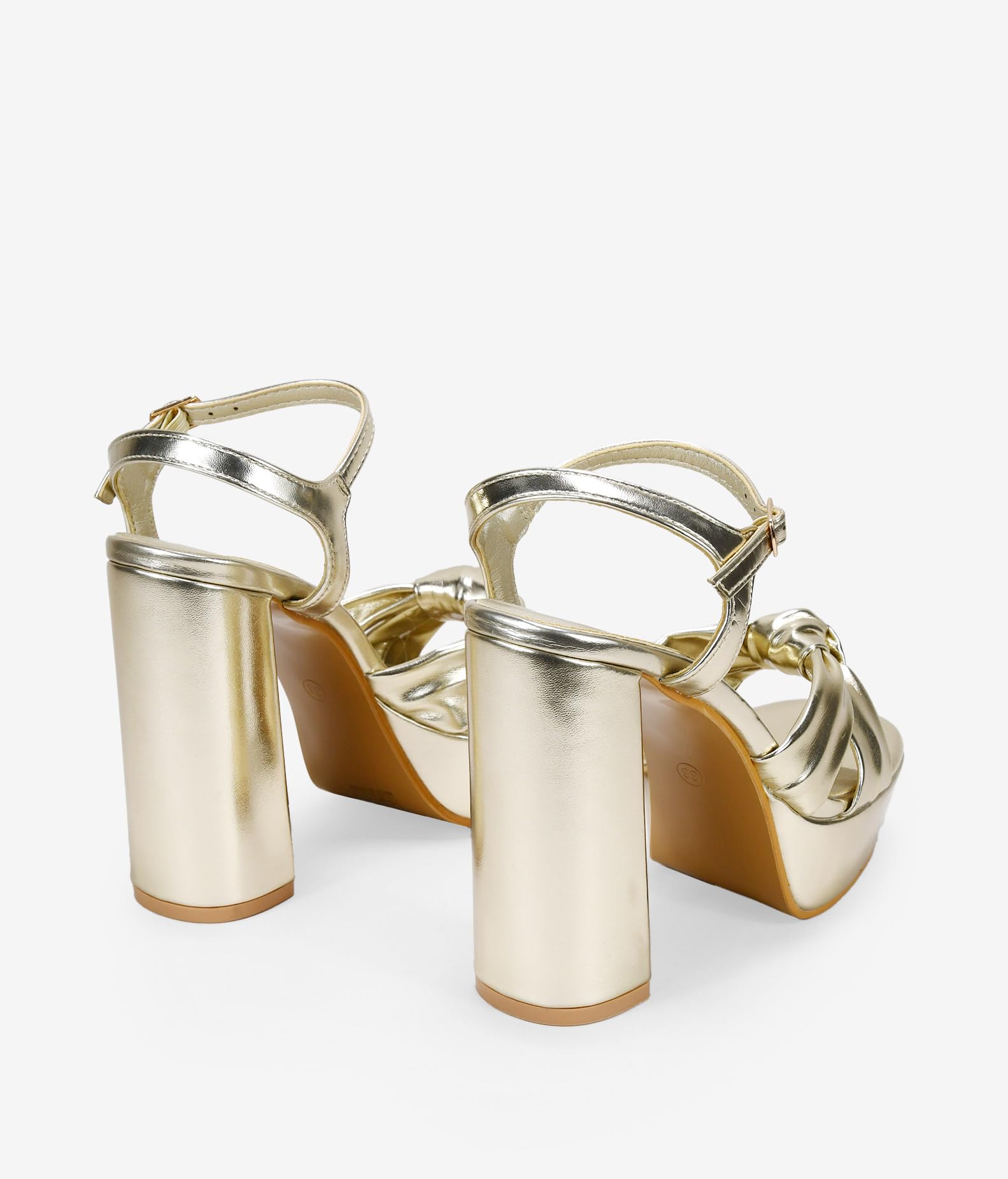 BOSANOVA Sandali da festa in oro metallizzato con dettaglio a fascia anteriore annodata e tacco XXL da 12,5 cm. Chiusura con cinturino sottile con fibbia alla caviglia. Scarpe da donna