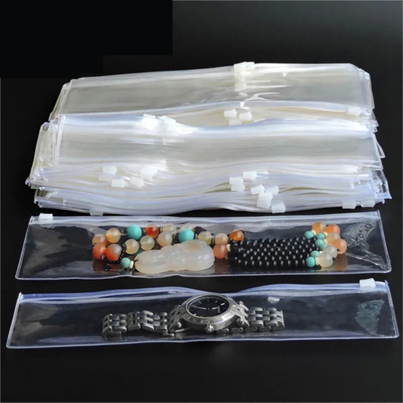 Lot de 200 sacs d'emballage longs en plastique PVC transparent pour bijoux, colliers, bracelets et montres - Anti-poussière et oxydation (A)