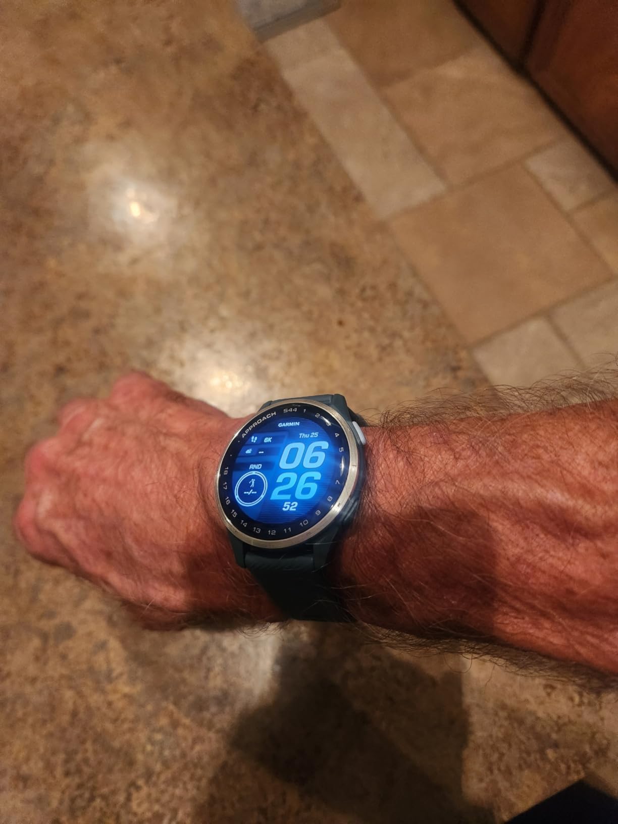Garmin Approach S44 slim profile on wrist