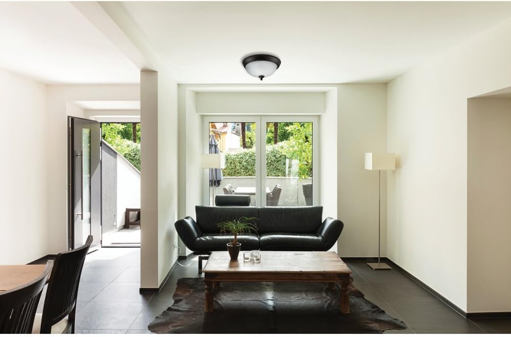 Close-up of Globe Electric 65186 Dobson light fixture showing internal wiring and bulb socket