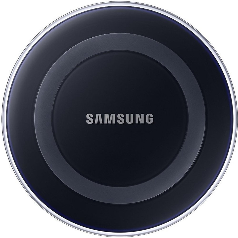 Samsung Qi Certified Wireless Charging Pad with a smartphone placed on top, showing charging status.
