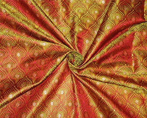 Brocart de soie or et rouge etoffe luxueuse pour haute couture