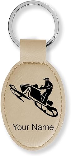 Vista 111 de LaserGram Llavero ovalado, moto de nieve, grabado personalizado incluido (negro con plata)