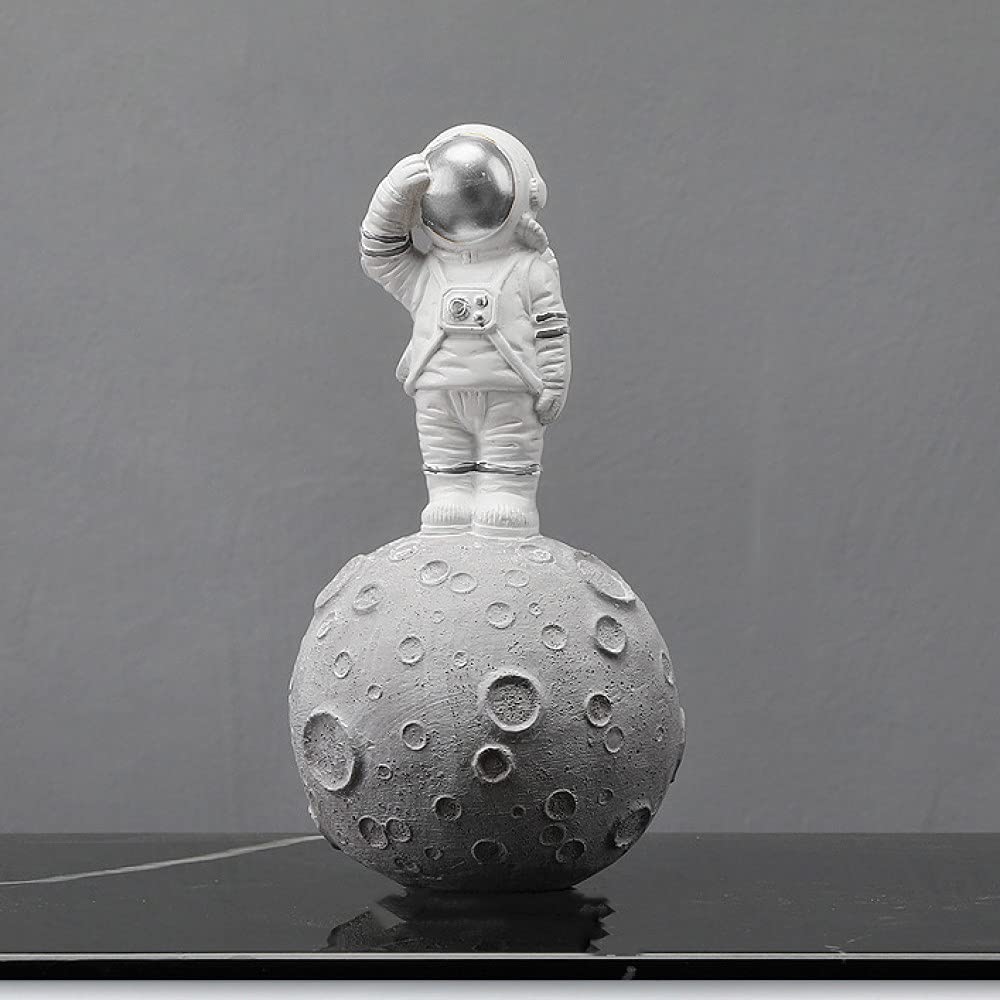 Figurines d'astronaute résine pour remplacer une décoration fade et sans âme