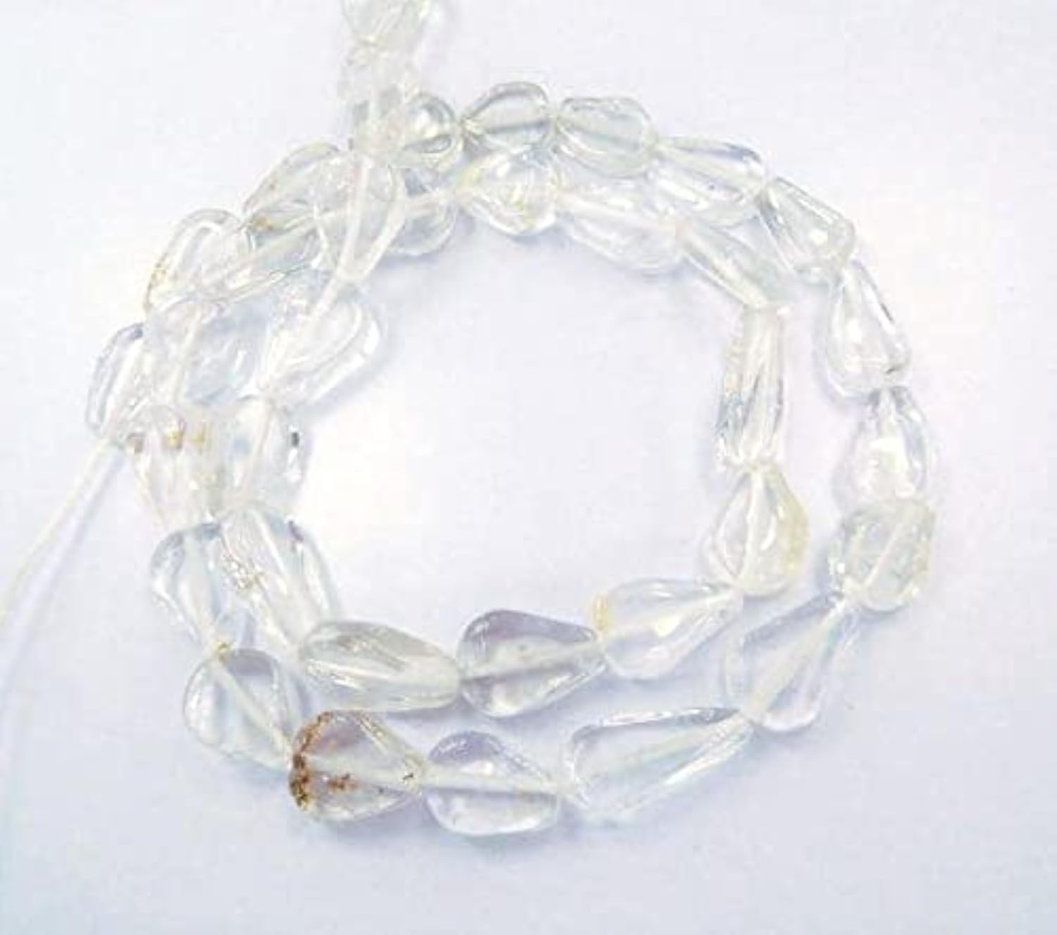 Quartz clair perles poire briolette de 7 à 13mm en fil de 33cm pour création