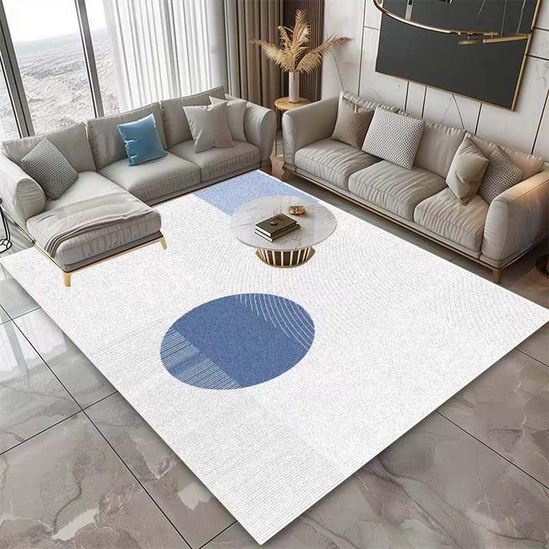 Tapis géométrique moderne bleu lavable pour en finir avec les tapis qui glissent au salon