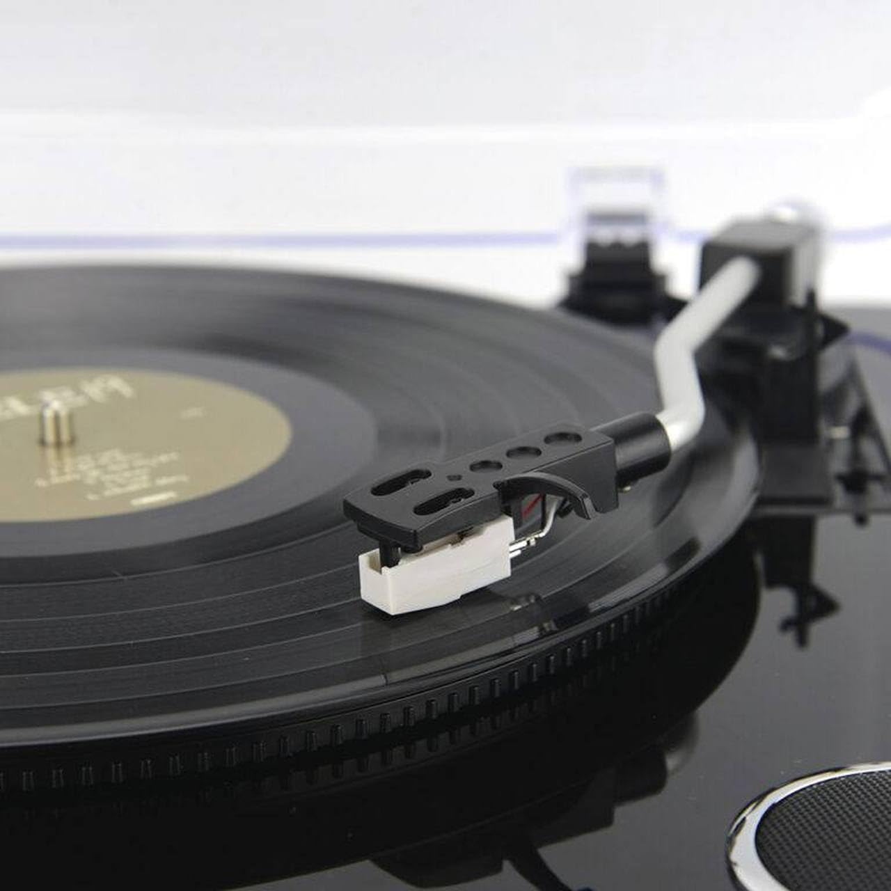 Close-up of the tonearm and stylus on the AIWA LPS-25BK Turntable.