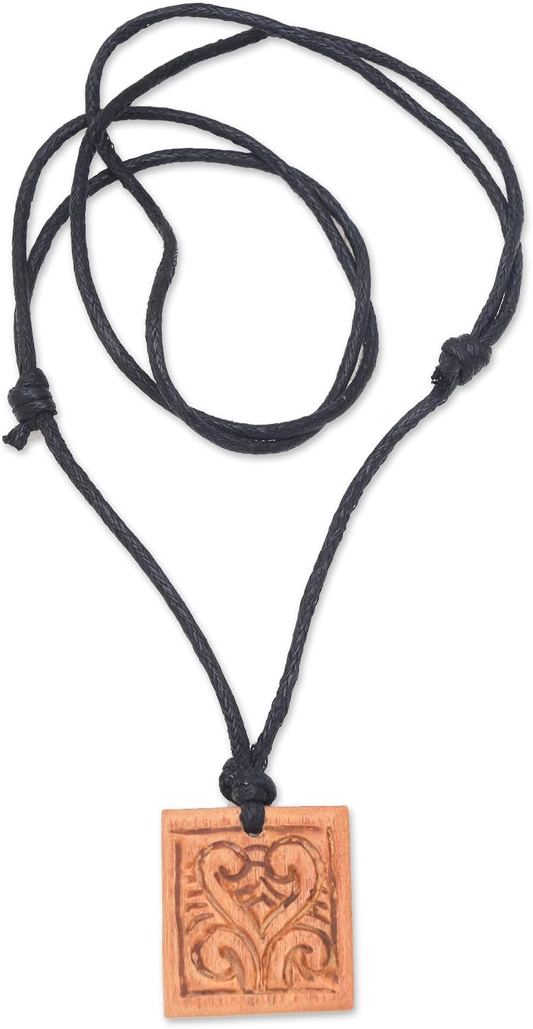 NOVICA Artisan Handmade Men's Wood Pendant Necklace Sawo with Cotton Cord Brown Indonesia Bohemian [necklace 14.25 in min L x 27 in max L x 0.1 in W Pendant(s) 0.9 in L x 0.8 in W x 0.1 in ]