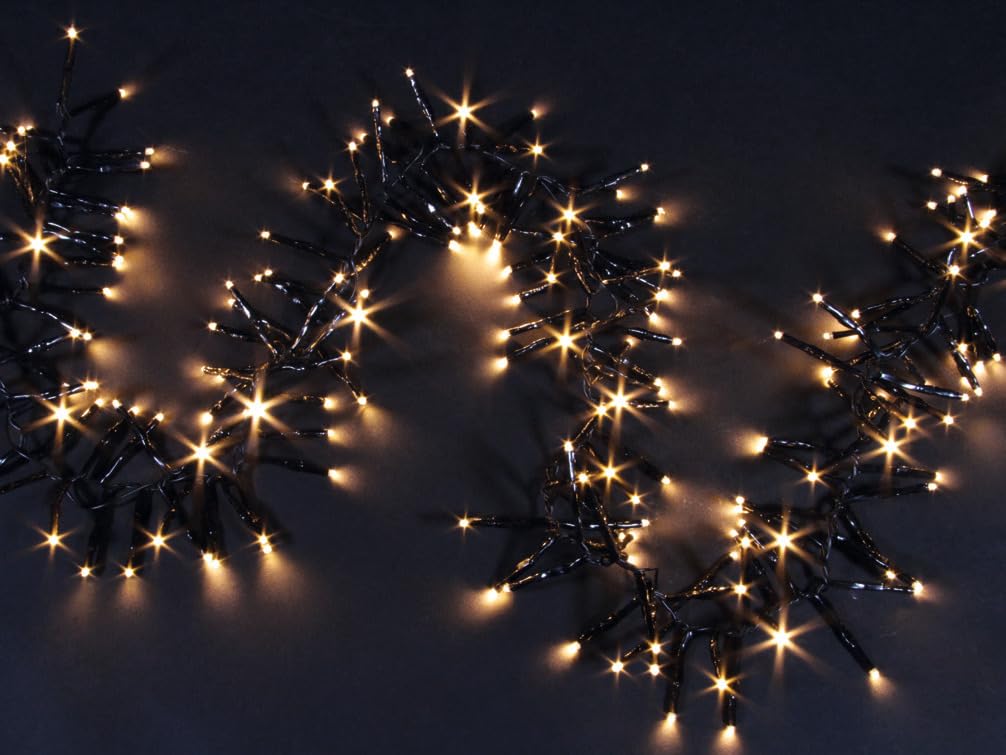 Idena 31898 - Catena luminosa a LED con 1152 LED bianco caldo, lunghezza circa 28 m, per esterni e interni, con timer da 8 ore e trasformatore, come decorazione per feste e decorazione natalizia