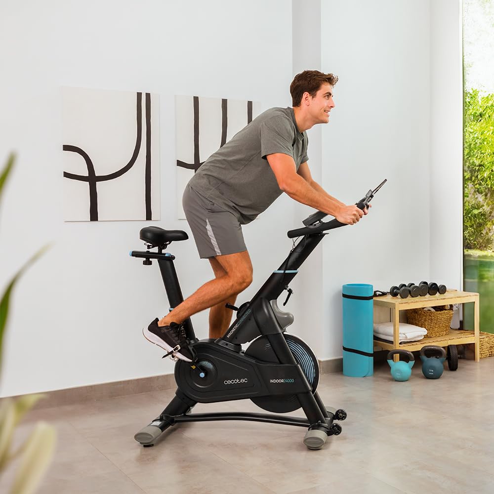 Cecotec Wewnętrzny rower treningowy z rezystancją magnetyczną i kierownicą bezwładnościową 24 kg DrumFit Indoor 24000 Magnetic Connected. APP, 8 poziomów rezystancji, regulowany ekran, siodełko i