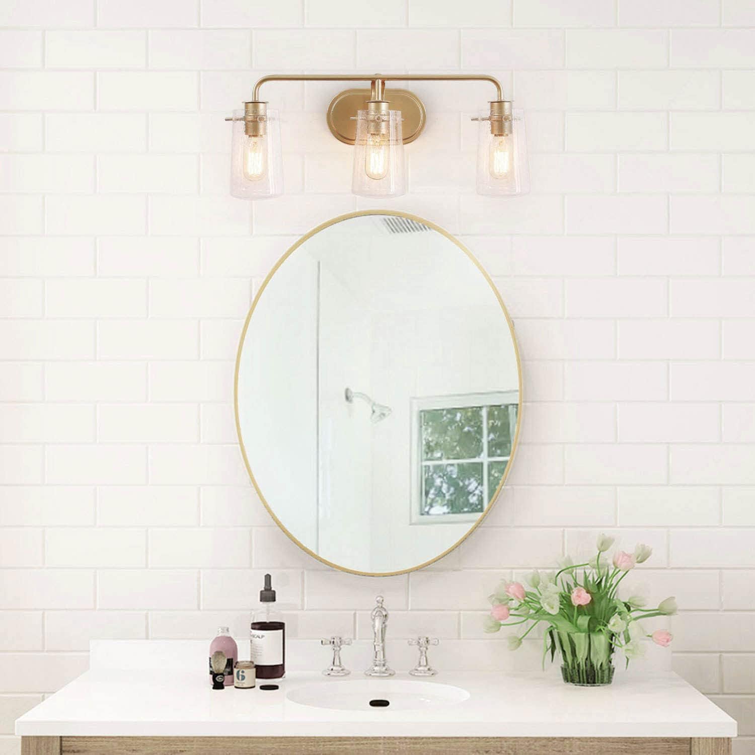 KSANA Gold Bathroom Light Fixtures, Modern Vanity Lights for Bathroom, 3-Light Bathroom Lights Over Mirror with Seeded Glass Shade and Soft Gold Finish, 22.5’’ L x 5.5’ W x 9’’ H