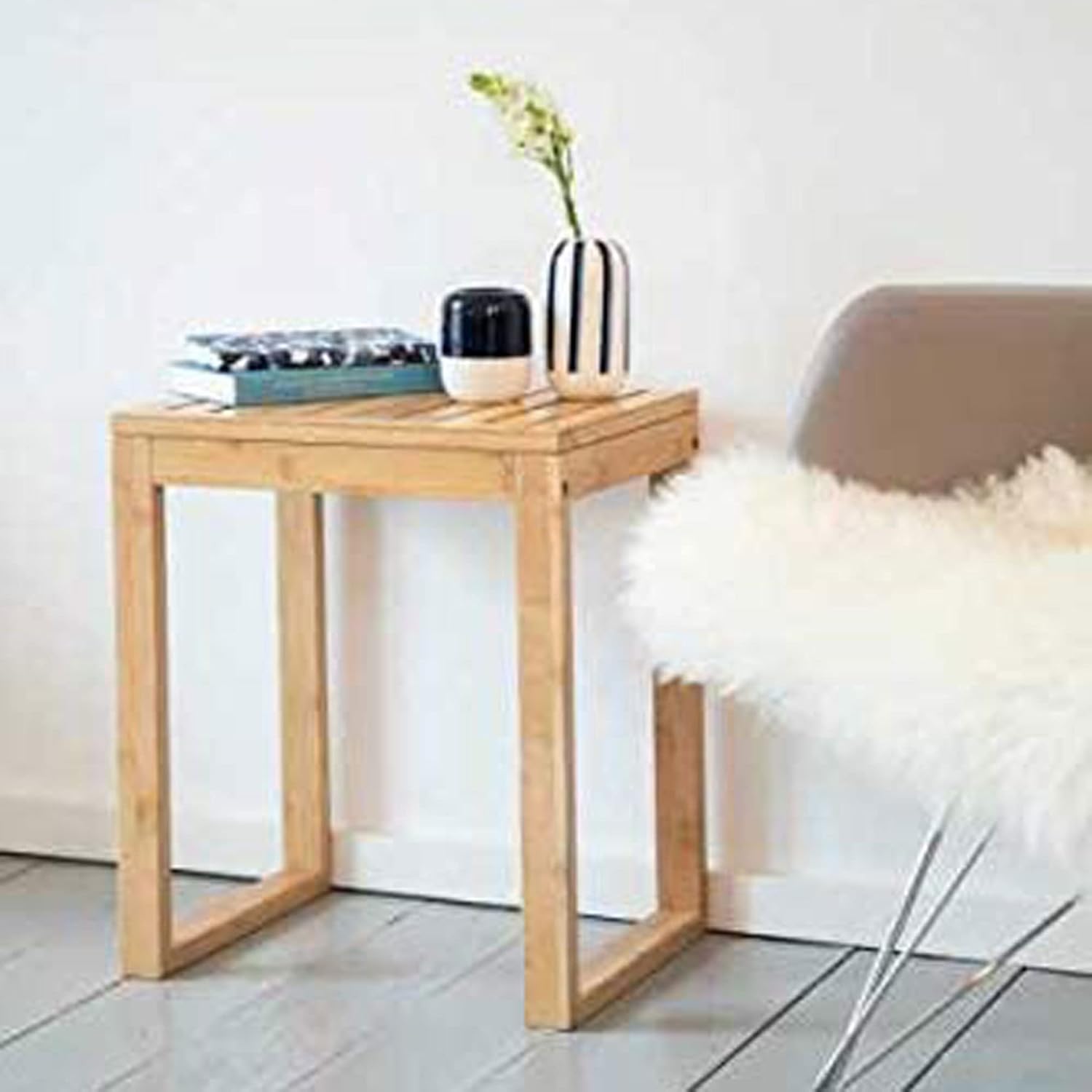 WENKO Bamboo Stool used as a side table in a living room