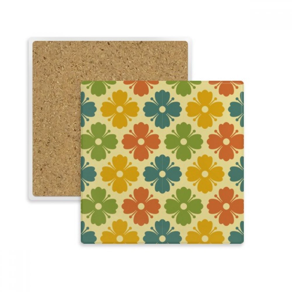 Idée cadeau originale avec ce dessous de verre en pierre à motif floral coloré