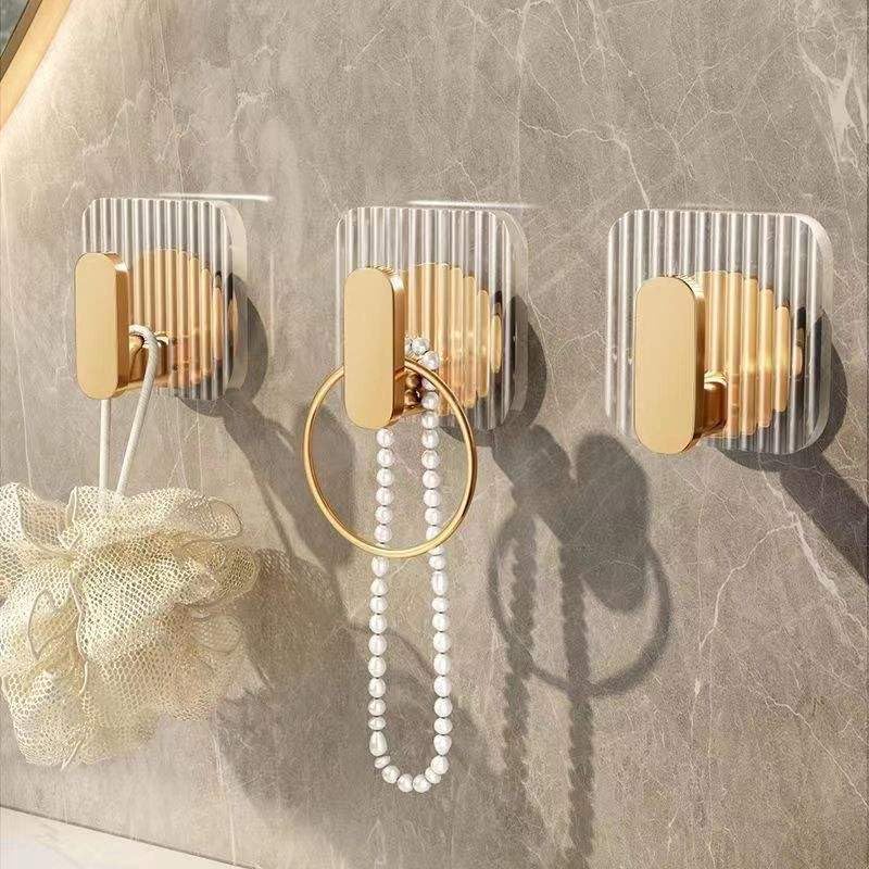 Image of LEAWALL Heavy Duty Adhesive Wall Hook, Waterproof Golden Self Adhesive Hook for Bathroom & Kitchen, Hook Hanger for Towels, Bags, Keys & Accessories, No Drill Wall Hook Set (4 Pcs)