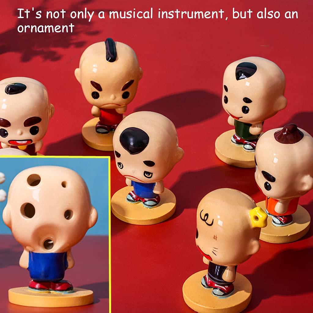 Początkujący ćwiczą grę na ceramicznych instrumentach okaryna z 4 otworami(Humanoid Ocarina D)