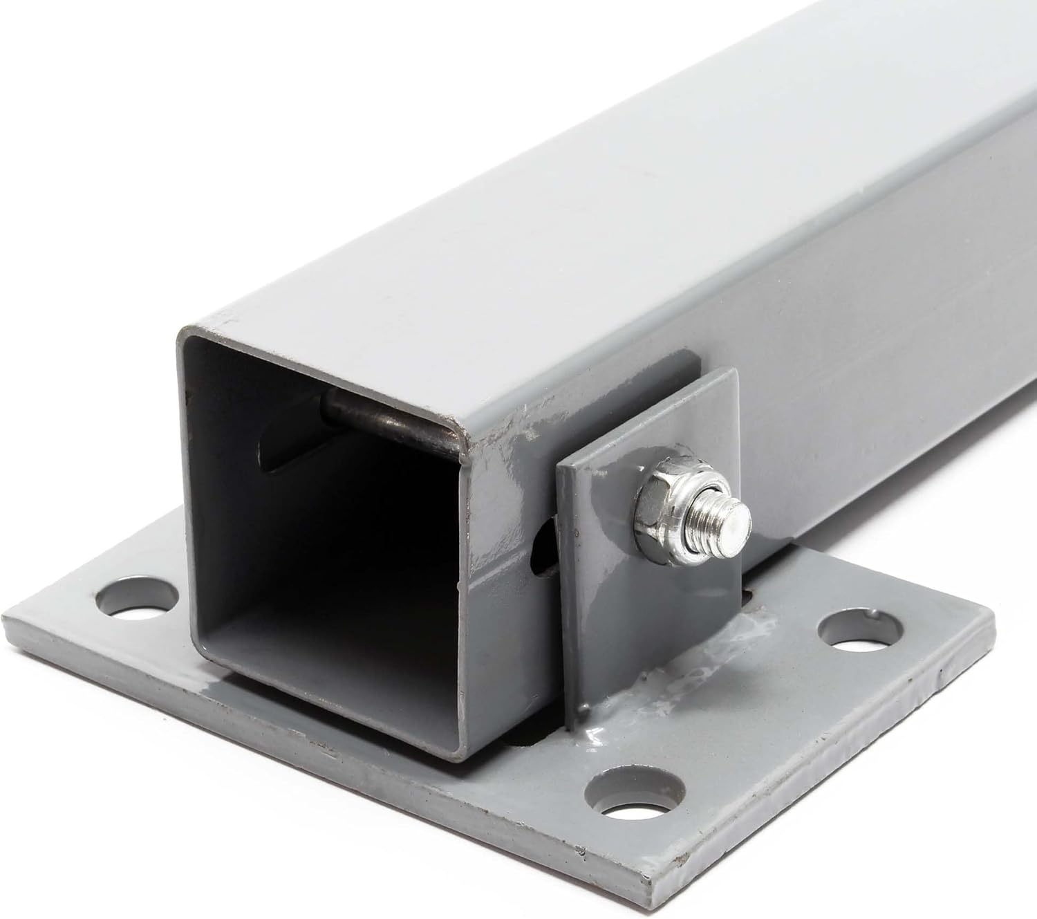 Close-up of the bollard's base plate and hinge mechanism