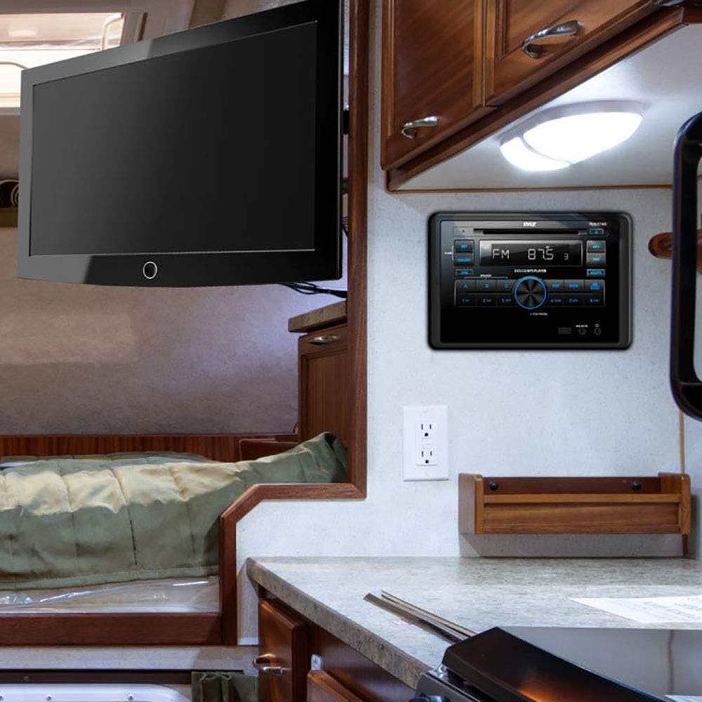 Pyle PLRVST400 installed in an RV wall panel next to a television