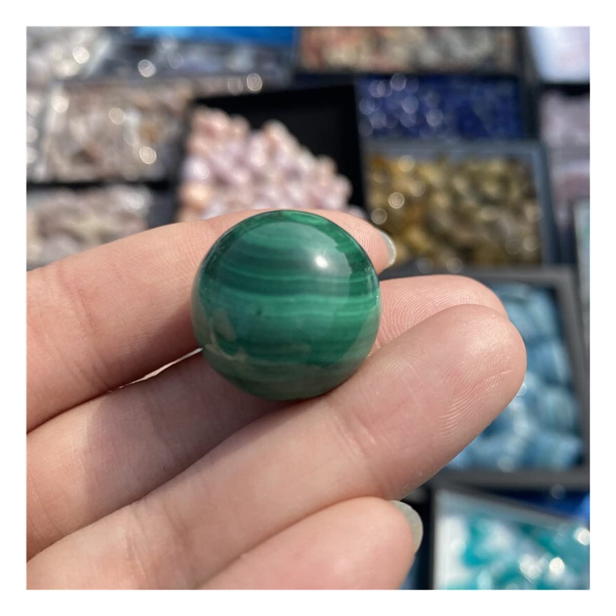 Piedras de cristal para el hogar: esfera de cuarzo y malaquita