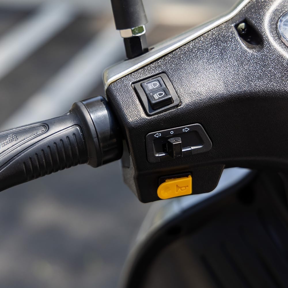 Close-up of the SUNDERWELL mobility scooter's handlebar controls, showing the light and horn buttons.