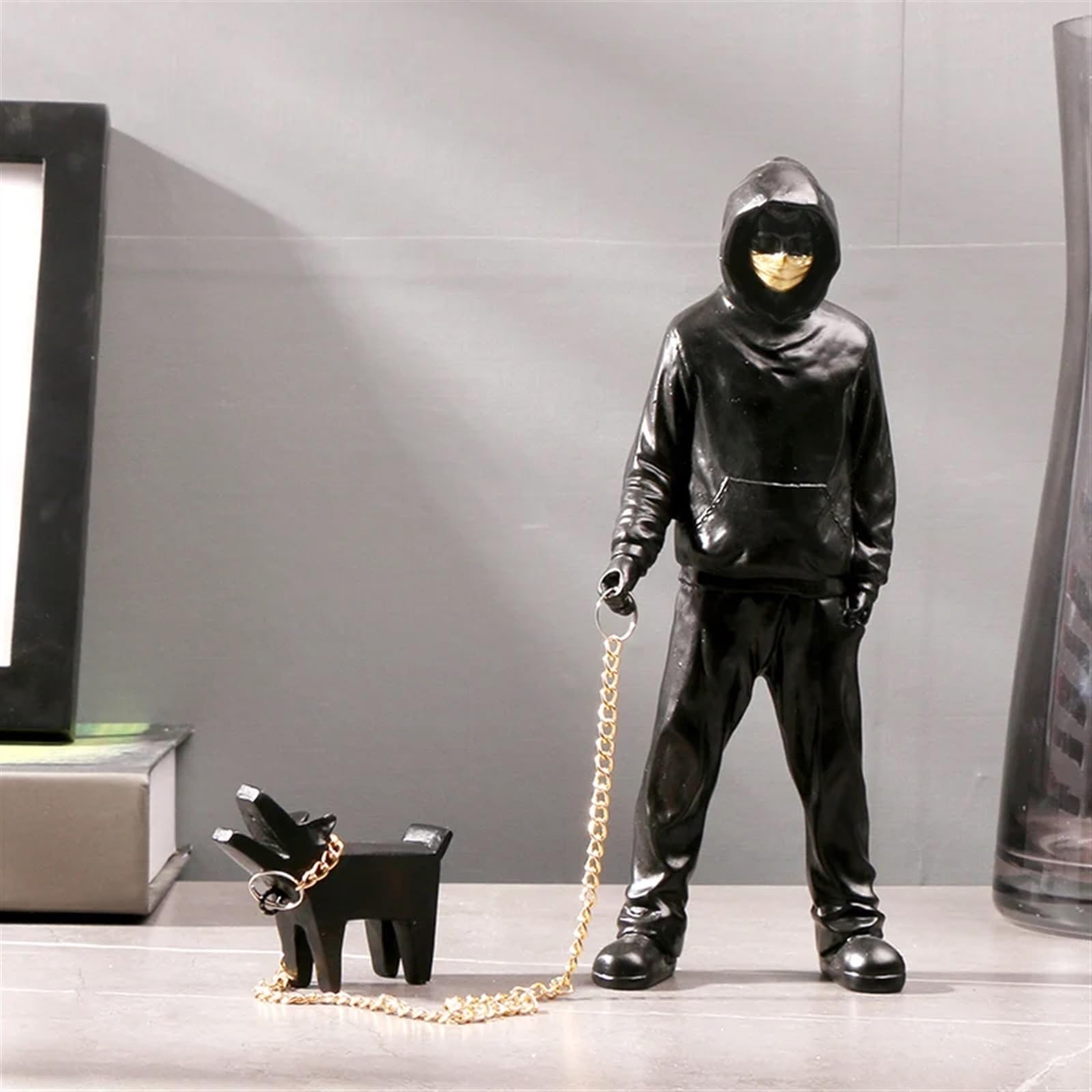 Habitz Blakc Banksy A Trendy Man Playing With Dogs Sculpture Banksy Street Art Replica Modern Statue Fashion Toys Art Sculptures And Ornaments For Living Room Office Desk Bookshelf Decoration(Blakc)