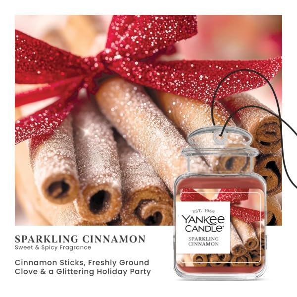 Image of Yankee Candle Car Jar Ultimate, Sparkling Cinnamon, Premium Hanging Vehicle Deodorizer Eliminates Daily Odors with a Warm Spicy Holiday Aroma, (Pack of 1)