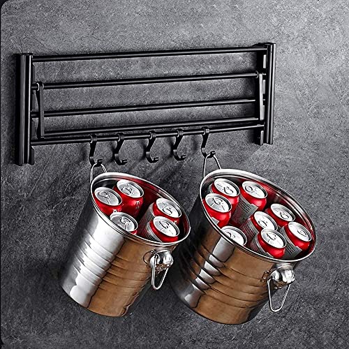 Barre de serviette pliable pour une douche ordonnée style grand hôtel