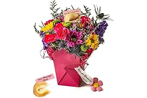 Fresh bouquet of vibrant pink flowers in a grab-and-go takeout container, with...