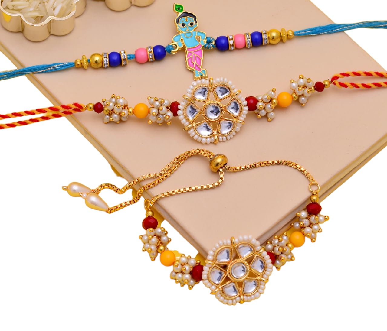 CARATWALA handmade designer kundan bhaiya bhabhi & kids -3 rakhi combo pack with roli chawal and raksha bandhan greeting card (B0CFFBS6SY) Amazon Price History, Amazon Price Tracker