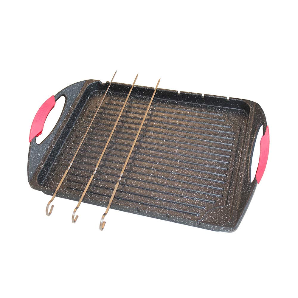 Griglia multiuso 100% antiaderente con rivestimento effetto pietra. Fondo ad induzione. Si può usare sia in forno che sul fornello. Porta spiedini. Manicature asportabili in Silicone