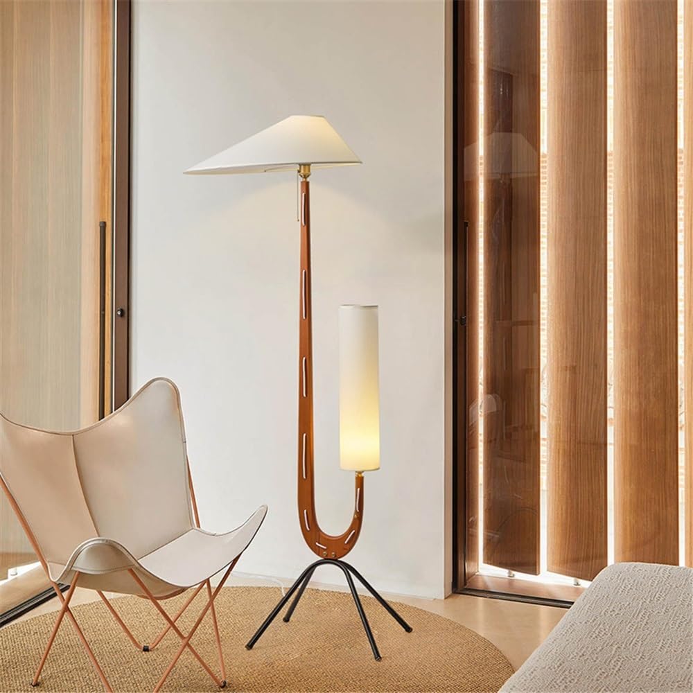 Lampa podłogowa z podwójną głowicą, atmosfera salonu, sofa, lampa pionowa