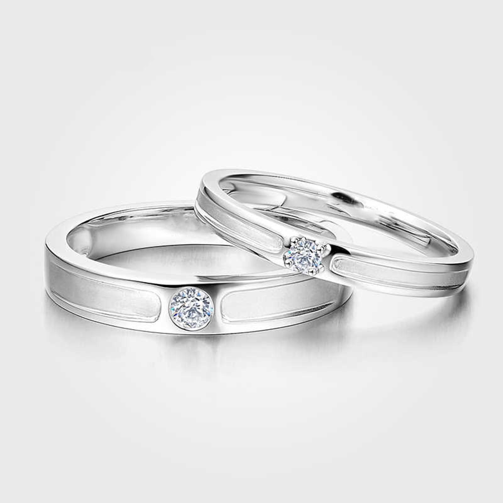 Elegante anillo de compromiso solitario de oro blanco y Pt950 para hombre y mujer con diamante