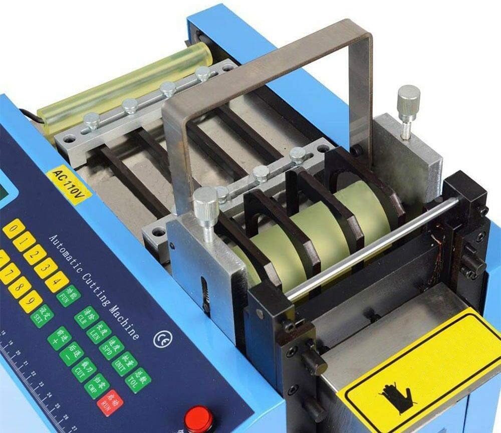 Close-up view of the MXBAOHENG YS-160W cutting mechanism and material feed rollers