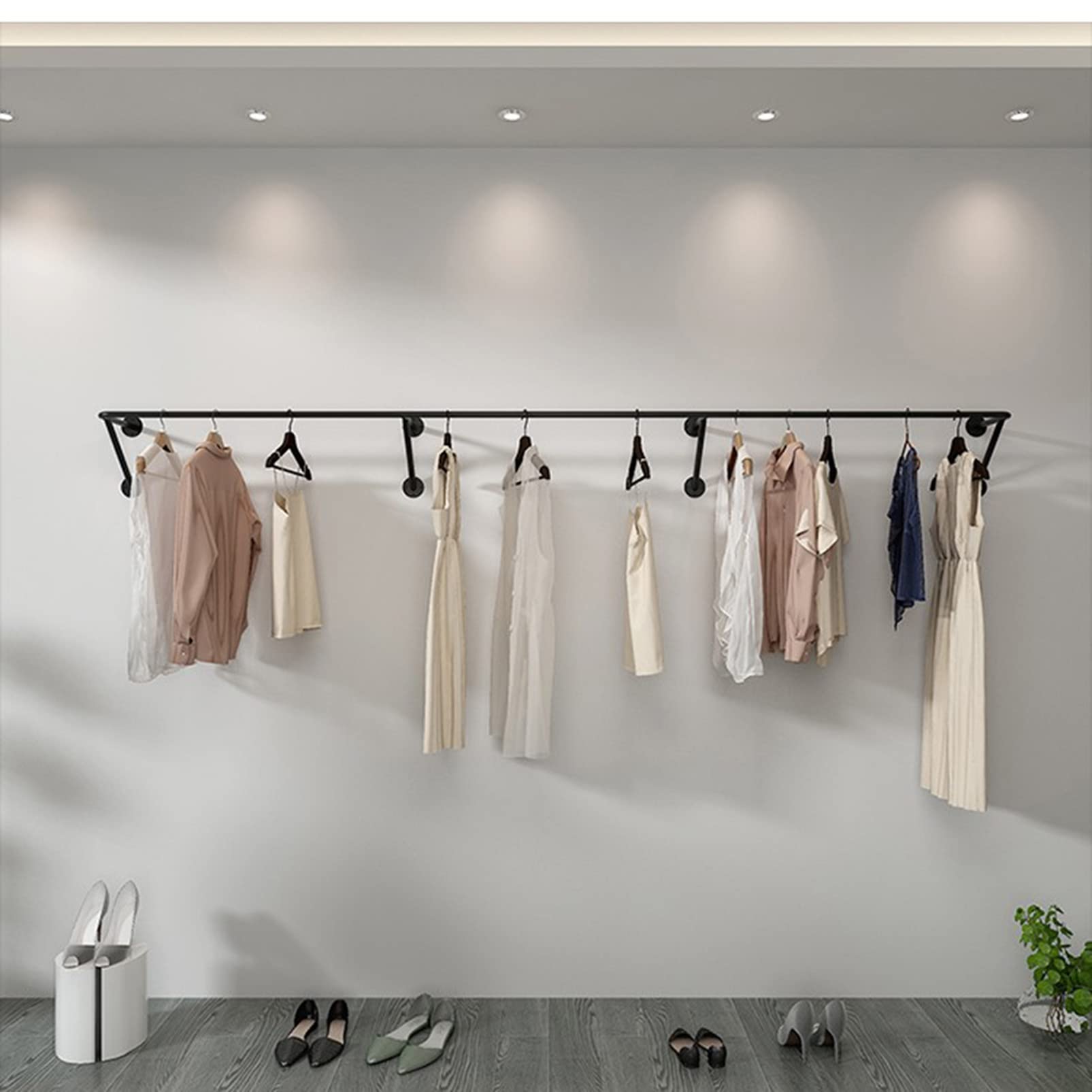 Moderno estante de exhibición de ropa industrial para tienda de boutique, soporte de ropa montado en la pared para merchandising