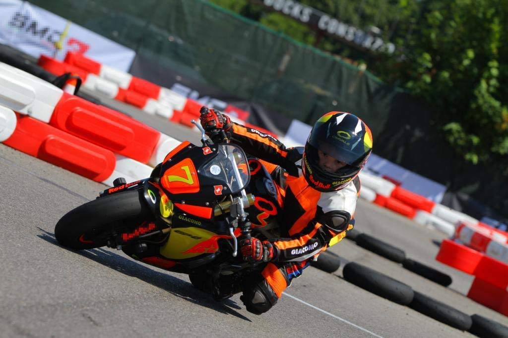 BI ESSE - Tuta da MINIMOTO per bambino in pelle e cordura professionale, completa di protezioni (Nero/Arancione, XL (10-11 anni))