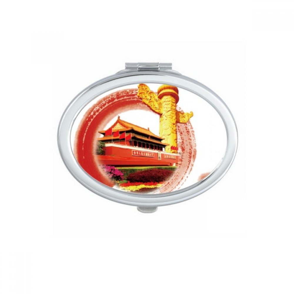 Miroir de poche à la main multicolore pour vos retouches en voyage