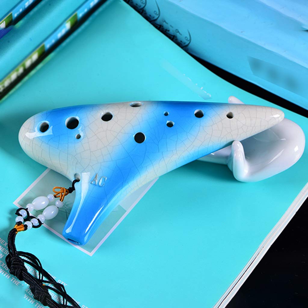 ocarina, Ocarina in argilla contralto Do a 12 fori, sfumata blu e bianca, incrinata