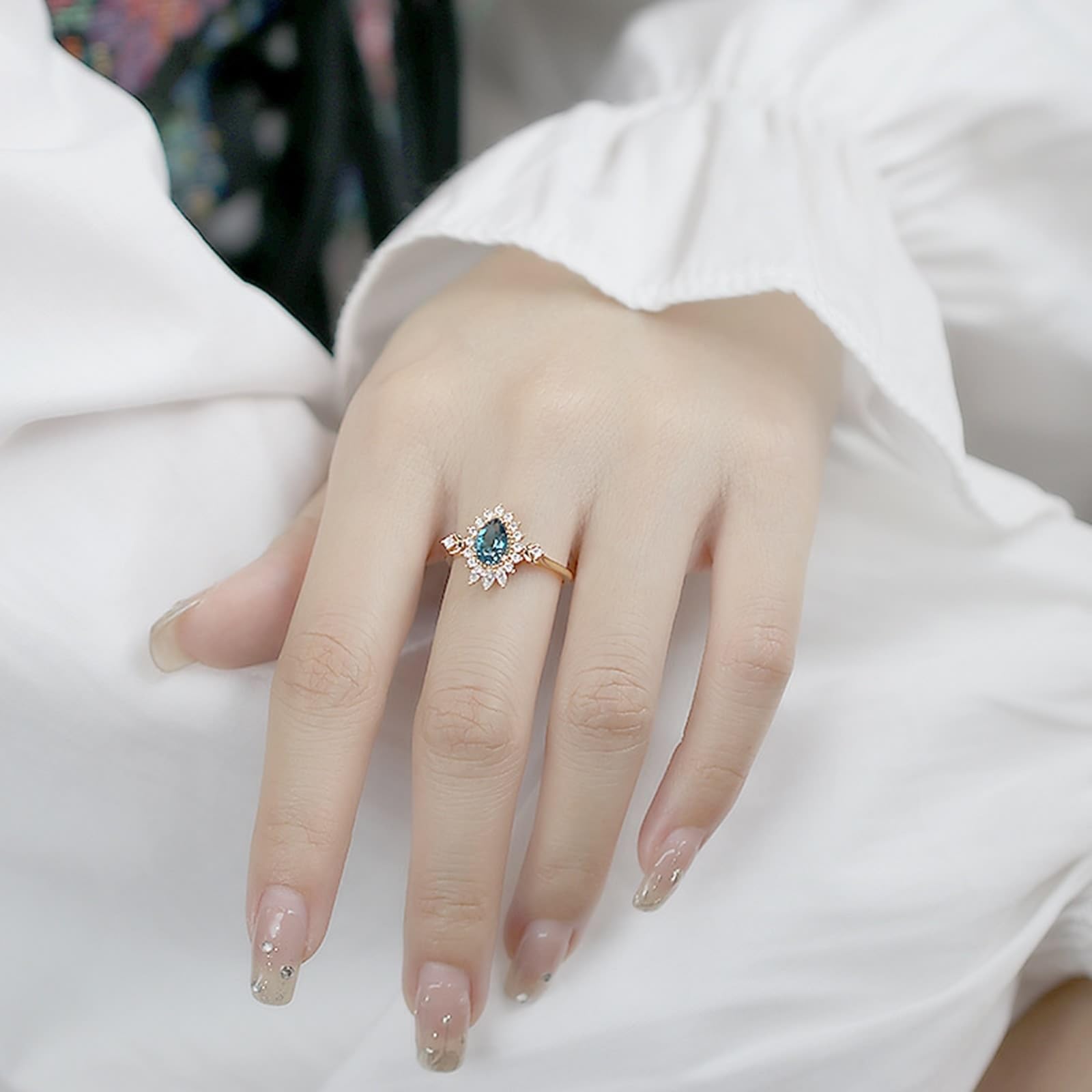 Anillo de boda de oro amarillo Au 375/585/750 con gotas de topacio azul, forma de flor