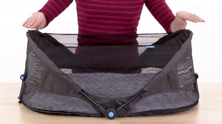 munchkin fold n go travel bassinet