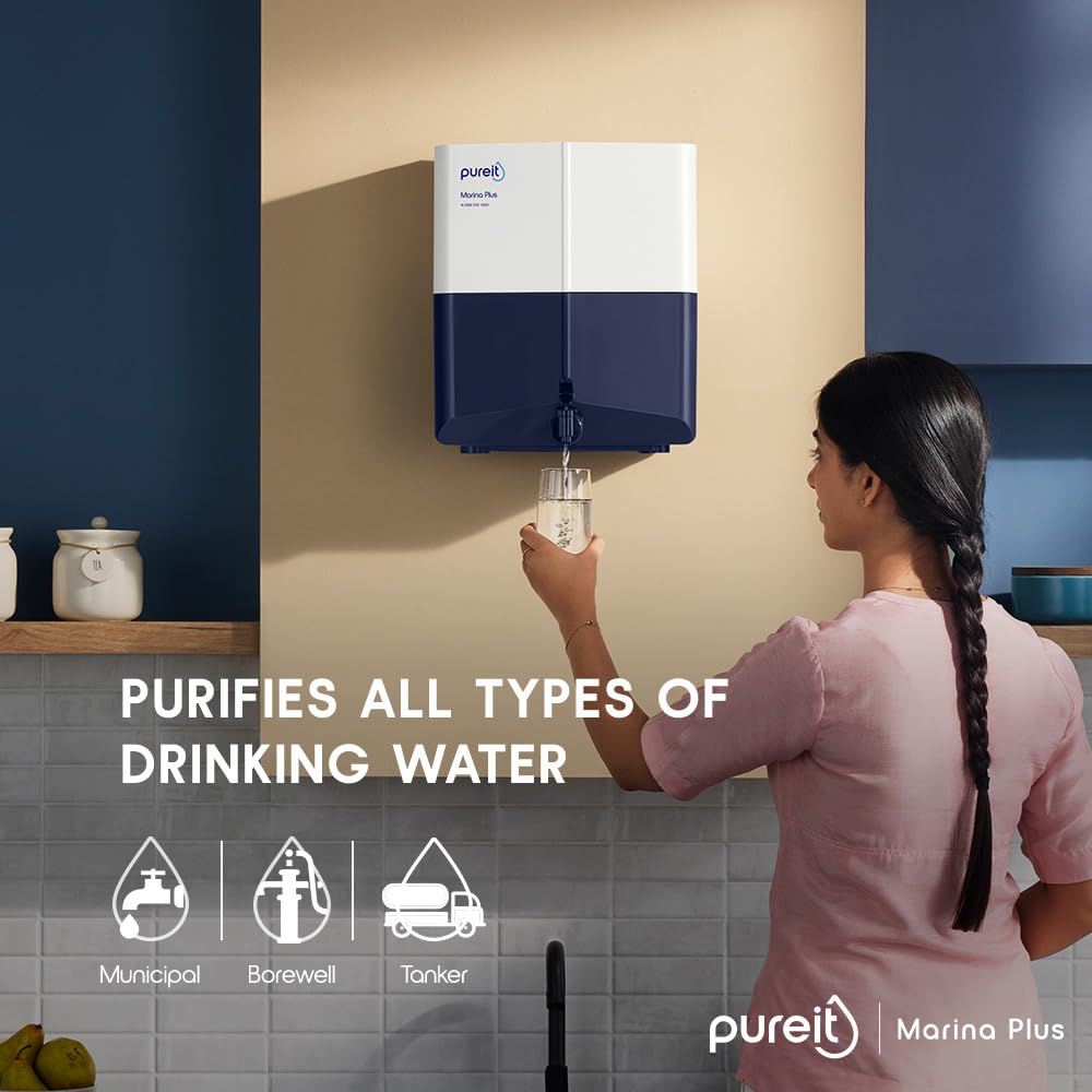 Woman filling a glass of water from Pureit Marina Plus Water Purifier, showing its ability to purify various water types