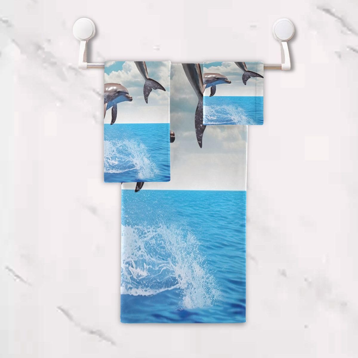 Nander Juego de toallas de algodón suave de 3 piezas, respetuoso con el medio ambiente, 1 toalla de baño, 1 toalla de mano, 1 paño de lavado, diseño de delfines saltando azul océano