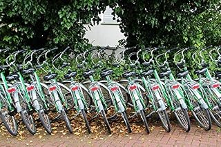 Home Comforts Bicycle Rental Cycling Series Bike Rental Station-20 Inch By 30 Inch Laminated Poster With Bright Colors And Vivid Imagery-Fits Perfectly In Many Attractive Frames
