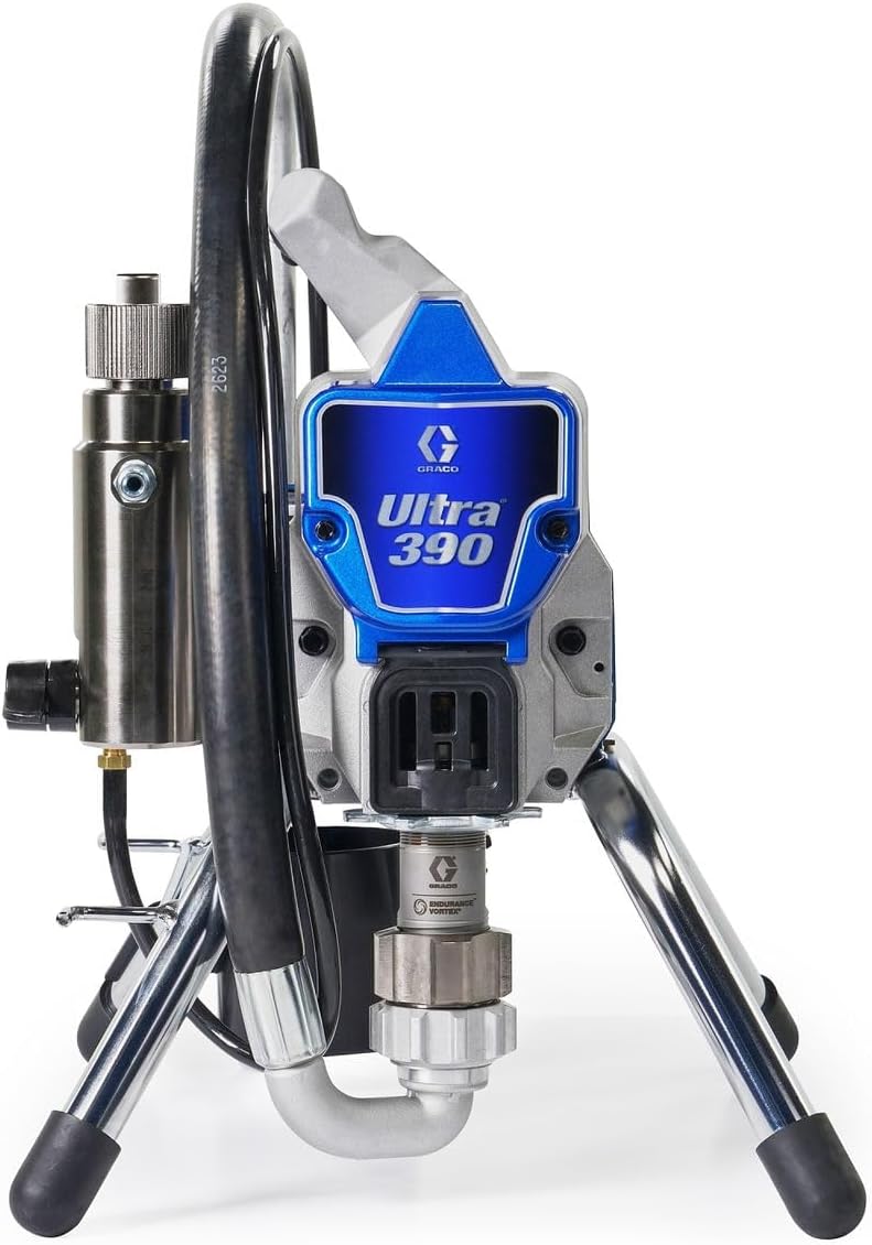 Side view of Graco Ultra 390 sprayer showing hose connections