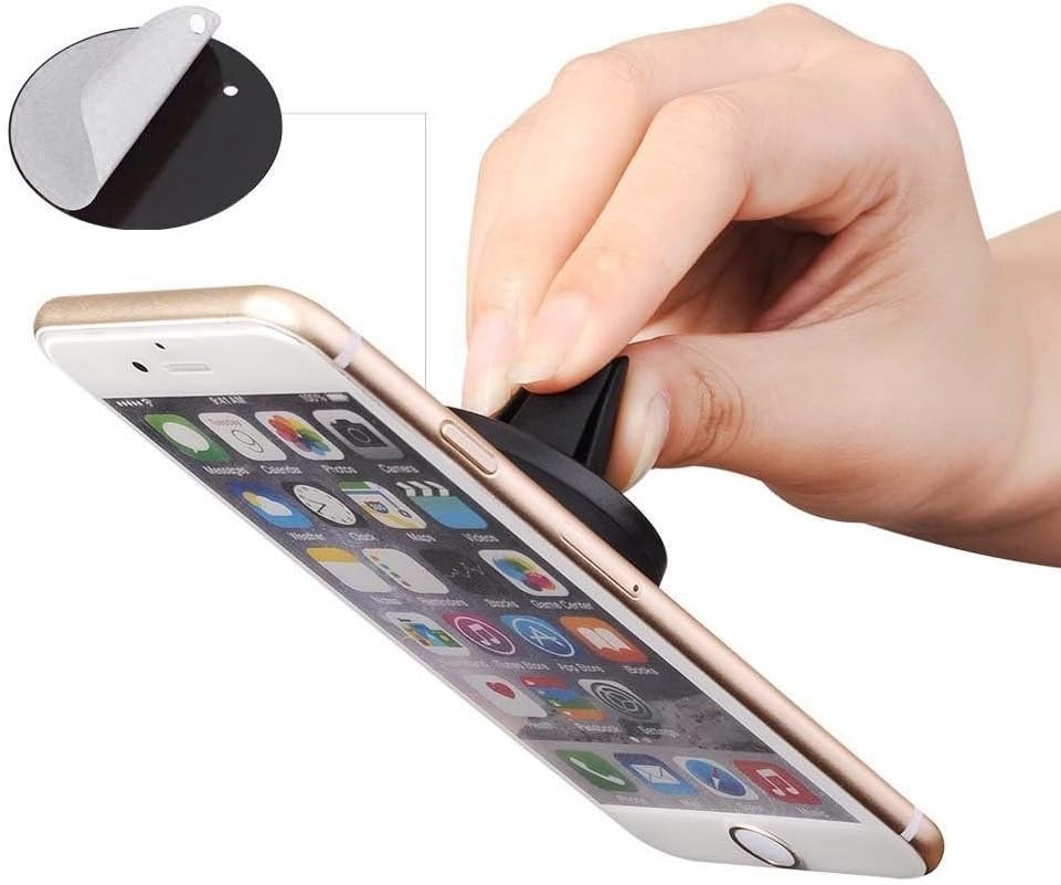 Hand holding a smartphone with a metallic plate being applied to its back
