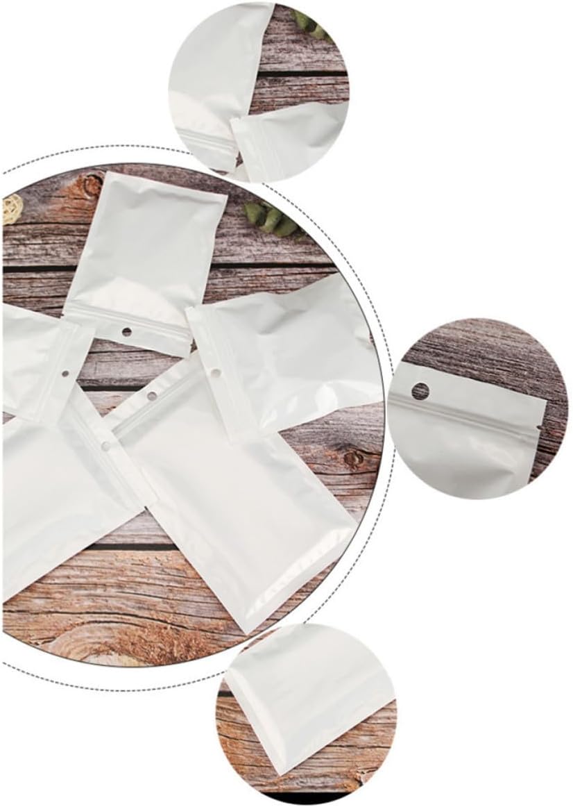 Ciieeo 100pcs Plastic Sealed Bag with Resealable Zipper and Hanging Hole Design, Odorless White Storage Pouch for Garage and Office Use, Tear Notches Included for Easy Opening