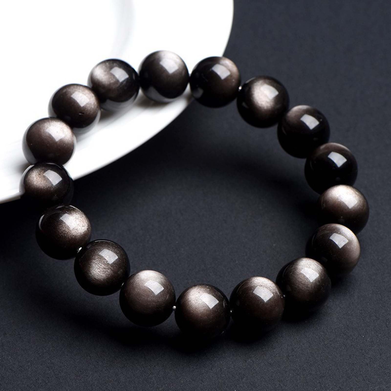 Bracciale con Perline di Ossidiana con lucentezza d'Argento