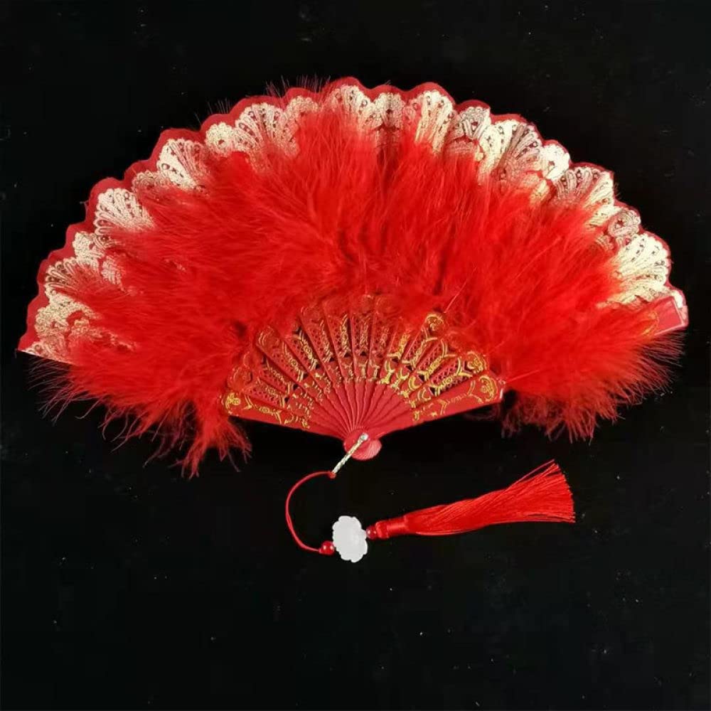 Abanicos de tela oriental roja contra el calor en fiestas y bailes