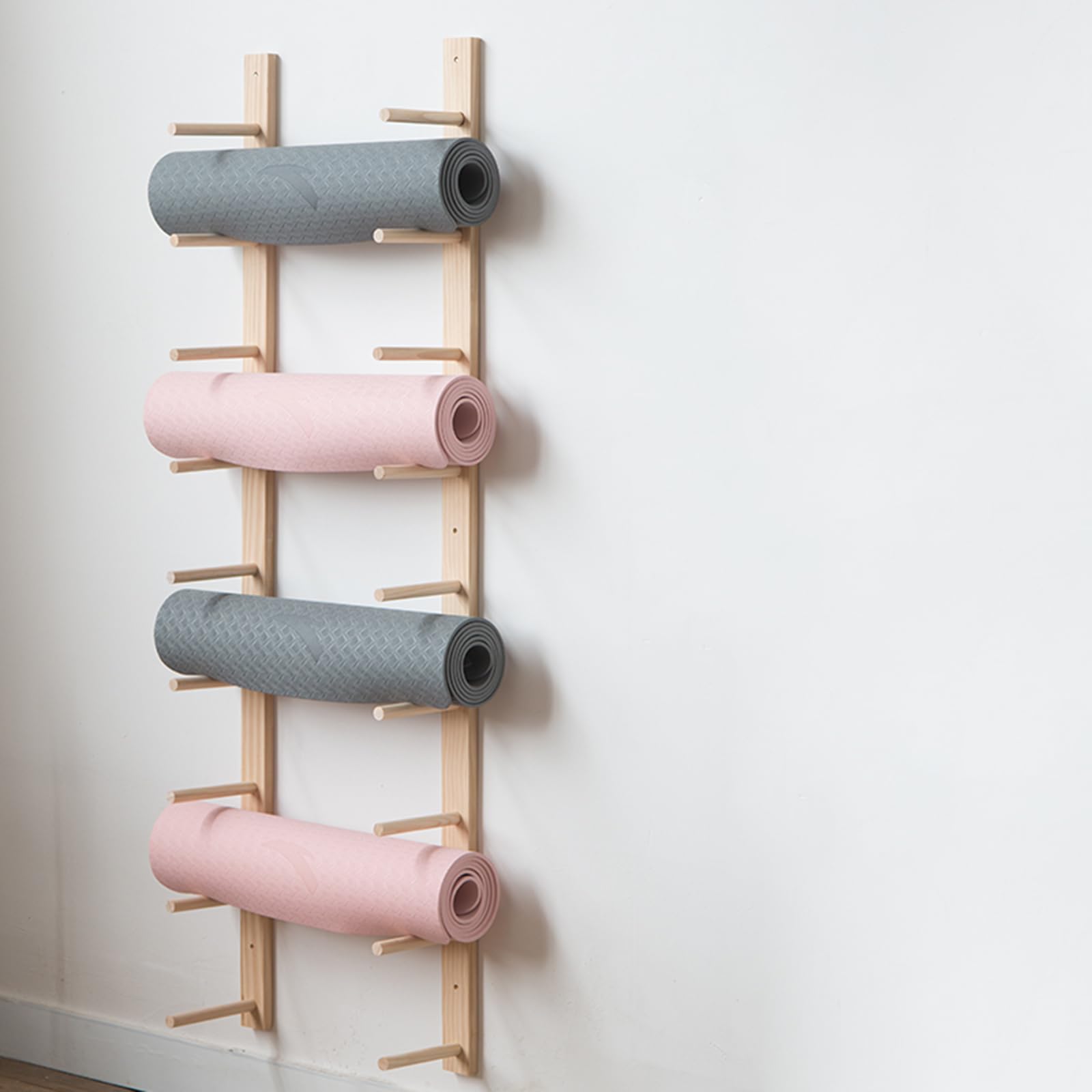 Soporte de pared para esterilla de yoga ideal para crear tu estudio en casa