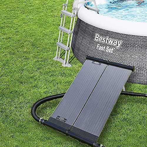 Monzana Solar Pool Heater placed on grass next to a Bestway Fast Set pool