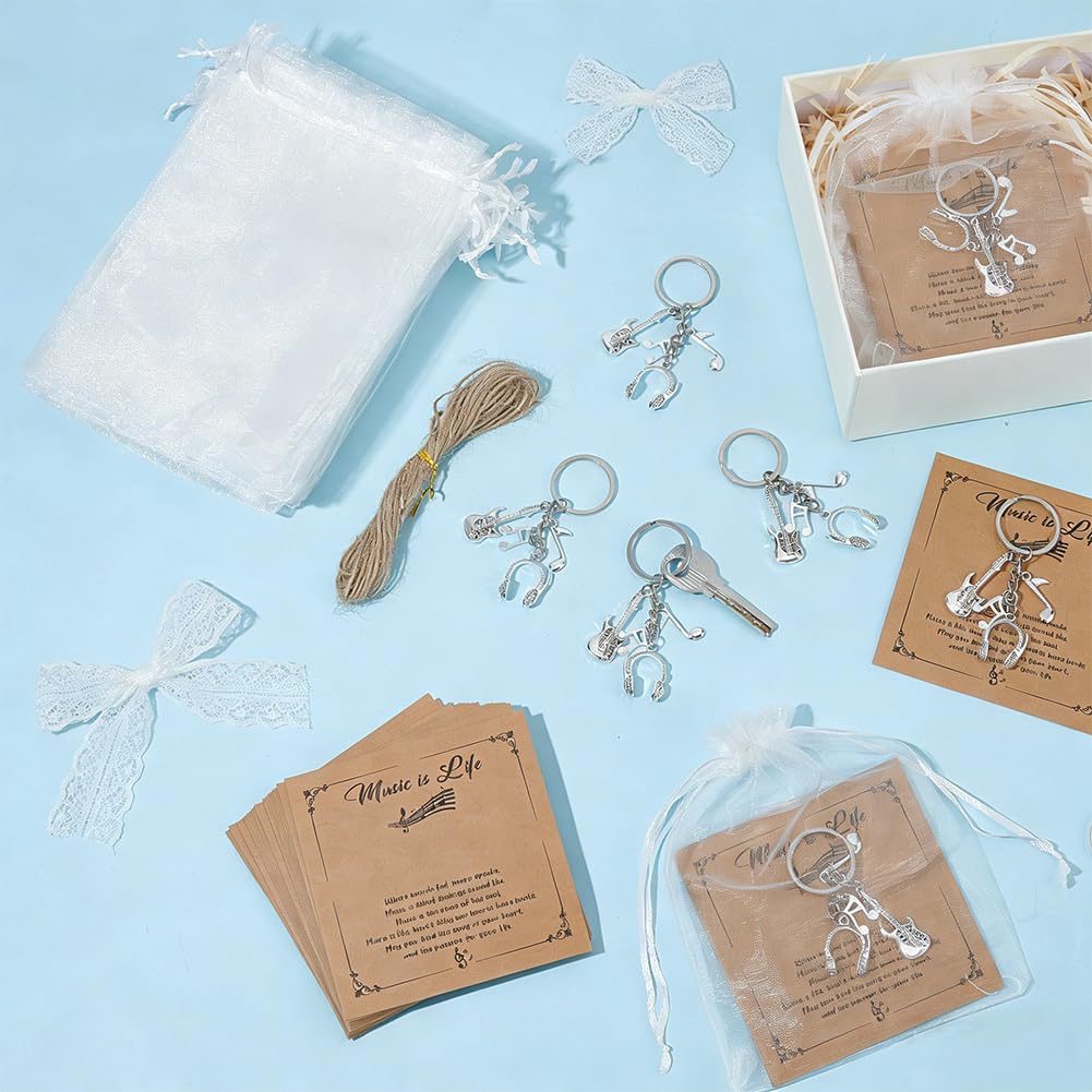 OLYCRAFT 24 Set Portachiavi a Tema Musicale con Chitarra Cuffie Note Musicali Portachiavi con Ciondoli Strumenti Musicali con Card Bustina in Organza per Musicisti Coro Decorazioni per Feste in Casa